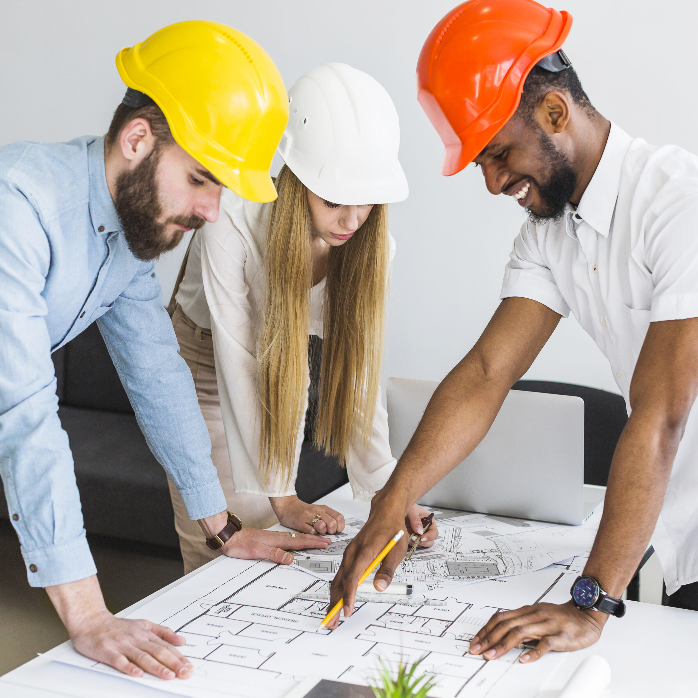 group-architect-discussing-layout-plan-blueprint-office