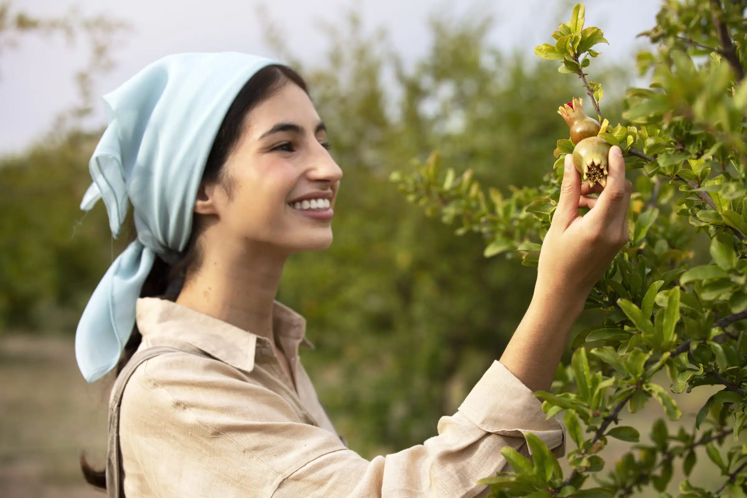 side-view-smiley-woman-looking-fruit